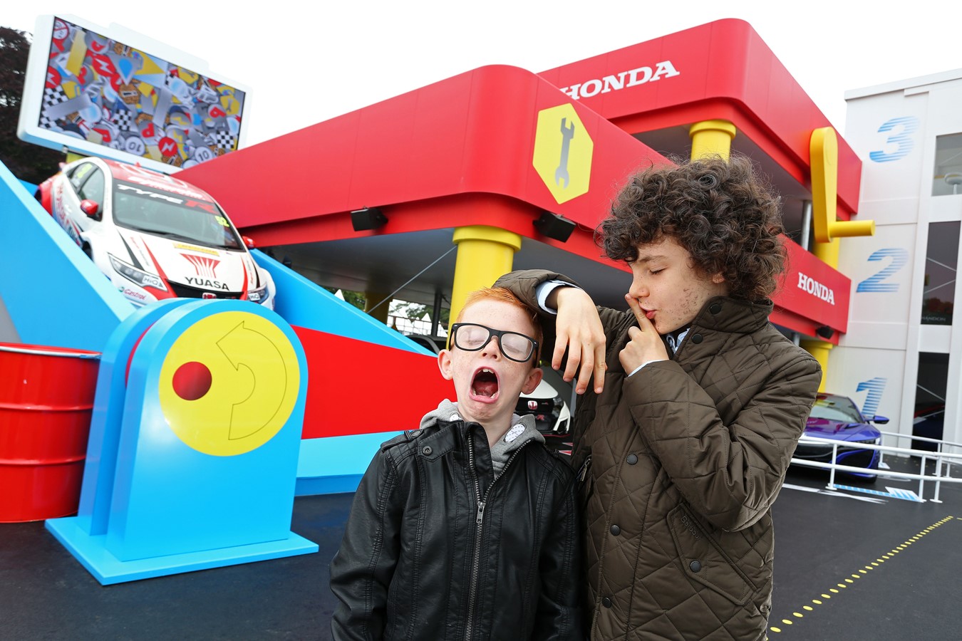 TOTS GEAR: CLARKSON AND EVANS LOOKALIKES GO HEAD TO HEAD AT GOODWOOD